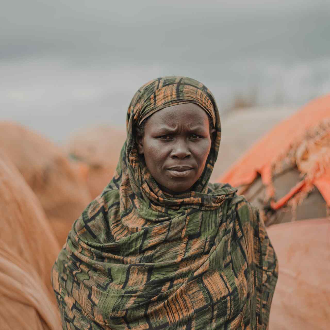 A woman poses for a photo outside in Somalia.